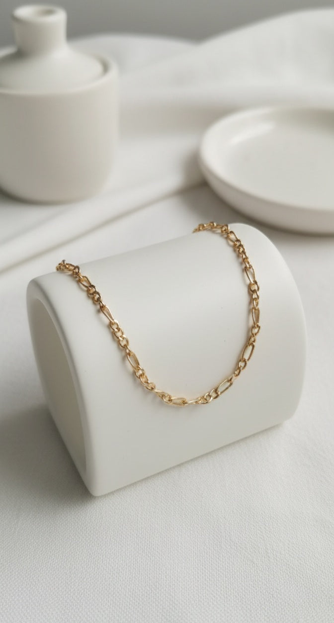 Gold-toned Anklets.